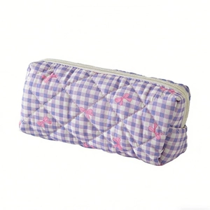 Quilted purple gingham cosmetic bag with embroidered pink bows and top zipper closure
