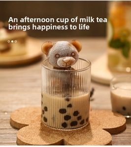 Brown 3D bear-shaped ice cube made with silicone mold inside a bubble tea glass cup