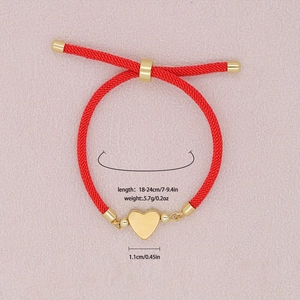 Adjustable red braided lucky cord bracelet with 18k gold-plated heart pendant for women
