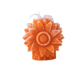 Artistic sunflower scented candle with orange gradient petals and a striped base design