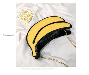 Creative banana-shaped crossbody bag with yellow PU leather and golden metal chain strap