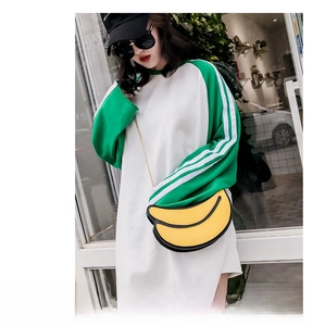 Banana shaped shoulder bag with yellow PU leather and golden metal chain strap