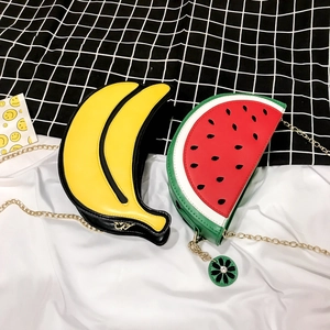 Creative fruit crossbody bag featuring banana and watermelon designs with gold chain
