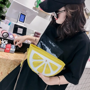 Creative lemon slice crossbody bag with yellow pulp stitching and gold chain strap