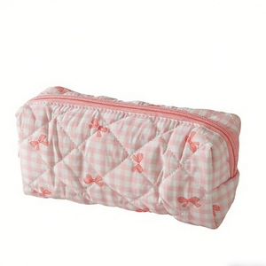 Pink checkered quilted makeup bag with bow patterns and soft portable hand-carry design