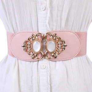 Pink elastic wide belt for women featuring a gold hollow metal buckle and white stones