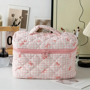 Quilted pink checkered handbag with bow patterns and soft handle for daily storage