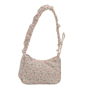 Floral canvas underarm bag with pink flowers and stylish ruched shoulder strap for women