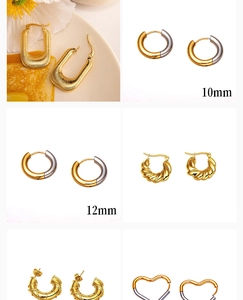 Detailed collection of assorted gold and silver stainless steel earrings in various sizes