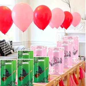 Close-up of assorted witch and princess theme party favor bags for birthday decorations