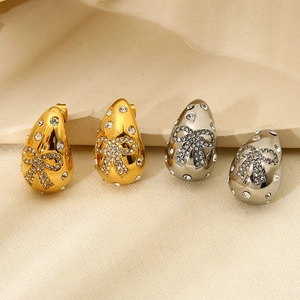 Bow-knot water drop stud earrings in gold and silver plating with shimmering rhinestones