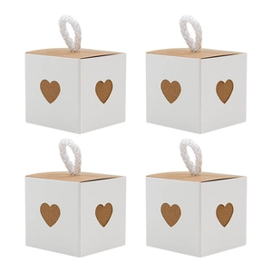 Set of four heart cutout kraft paper gift boxes with white rope handles for wedding favors