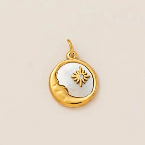 Golden sun and moon medallion pendant with mother of pearl inlay and crystal accent