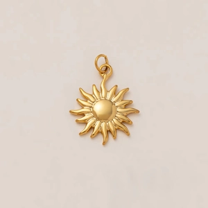 Detailed close-up of a golden sunburst charm pendant for DIY jewelry necklace making