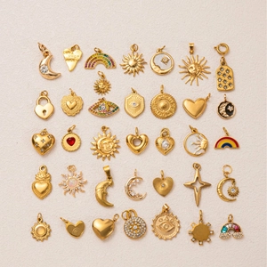 Assorted gold stainless steel charms with sun, moon, and heart designs for DIY jewelry