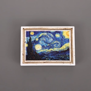 Macro shot of 3D resin fridge magnet featuring Van Gogh's Starry Night painting