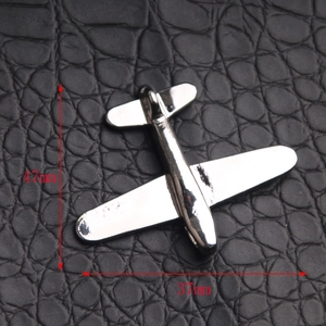 Polished silver airplane pendant on black texture with 47mm x 37mm size specs