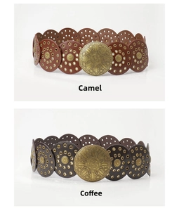 Detail view of retro bohemian leather belts with floral metal buckles in camel and coffee