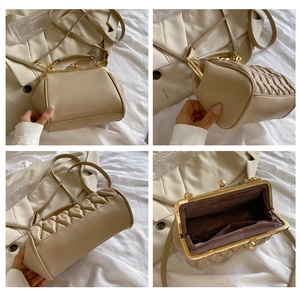 Detail view of beige quilted chain bag showing interior pocket and doctor bag clasp