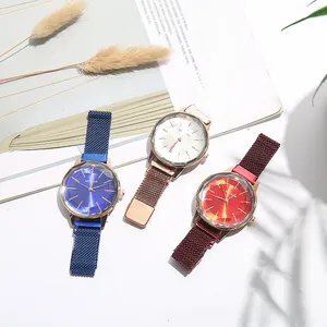 Detailed shot of cat-eye dials on Milanese mesh magnetic luxury watches for women
