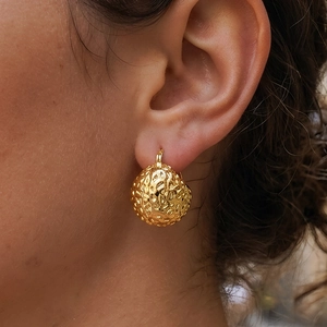 Elegant gold spherical stud earrings with textured hammered finish for women