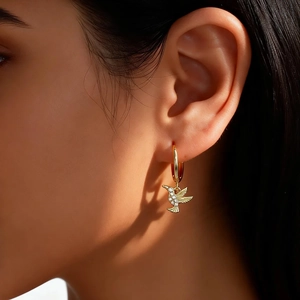 Exquisite gold S925 silver hummingbird drop earrings with sparkling zircon accents