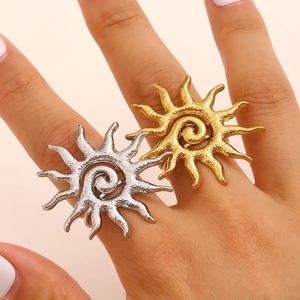 Minimalist hollow sun stainless steel rings in gold and silver set on finger