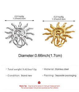 Detailed view of hollow sun rings in gold and silver finish with stainless steel specs