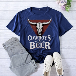 Flat lay of navy Cowboys & Beer skull print t-shirt with jeans and white sneakers