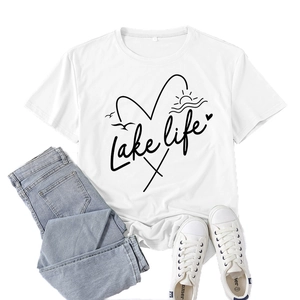 White Lake Life heart graphic T-shirt paired with denim jeans and sneakers