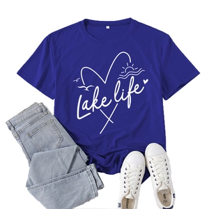 Royal blue Lake Life print T-shirt paired with denim jeans and white sneakers