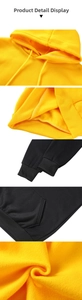 Detailed views of the Christmas tree hoodie showing ribbed cuffs and fleece lining texture