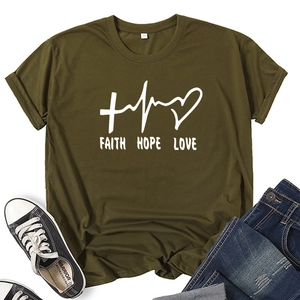 Detail of army green t-shirt with Faith Hope Love print and heart cross graphic