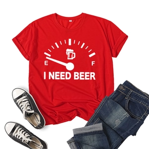 Detail of red cotton T-shirt featuring I Need Beer fuel gauge print with canvas shoes