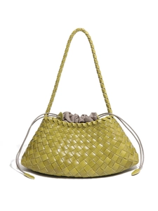 Handcrafted grass green woven leather handbag with drawstring liner and thin straps