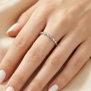 Minimalist 18k gold plated stainless steel beaded ring shown on model finger