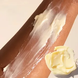 Macro shot of smooth yellow body glaze texture applied on skin for deep hydration