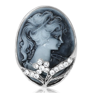Elegant vintage cameo brooch with female profile relief and sparkling crystal accents