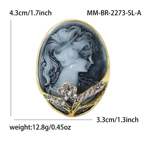 Vintage cameo brooch with blue female portrait relief and sparkling crystal flower accent