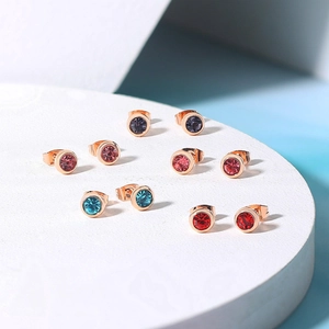 Detailed set of five pairs of 4mm zircon stud earrings in diverse vibrant colors