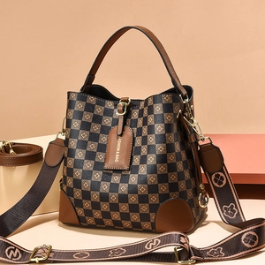 Retro drawstring bucket bag with checkerboard pattern and wide adjustable shoulder strap