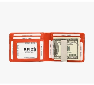 Interior de cartera de cuero naranja con protección RFID y clip metálico de dinero