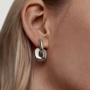 Modern interlocking silver link earrings made of polished stainless steel for women