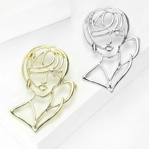 Minimalist hollow portrait profile brooch set in gold and silver finish with crystal