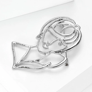 Detailed view of the silver hollow abstract rose brooch with metal plating texture