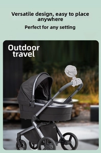 Octopus tripod fan mounted on a black baby stroller handle for outdoor cooling