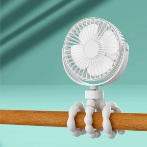 White octopus mini fan with flexible tripod legs wrapped on a wooden pole