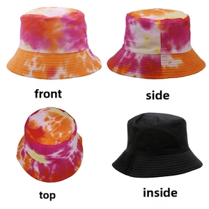 Four-angle view showing pink tie-dye pattern and solid black interior of cotton bucket hat