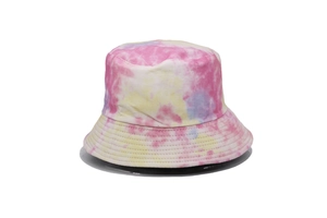 Detailed view of tie-dye bucket hat stitching and vibrant pink and purple patterns