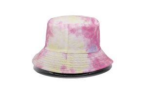 Detail of pink and yellow tie-dye bucket hat showing stitching on cotton fabric